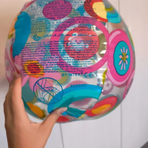 Inflatable beach ball and small plastic ball