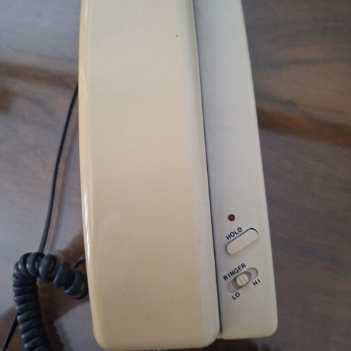 Vintage 90s wired home phone, decorative and functional