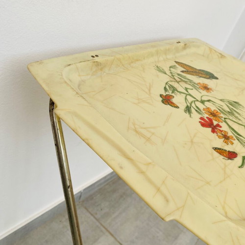 Plastic and metal Mid Century folding table used with painting and inlaid fibers