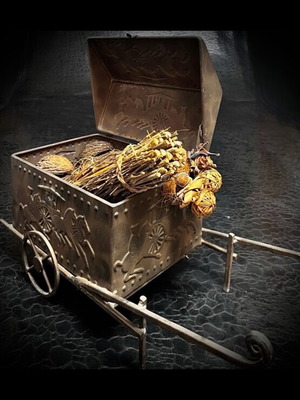 Decorative cart with dried plants like new