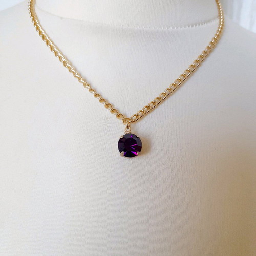 Necklace with purple crystal new with gold chain