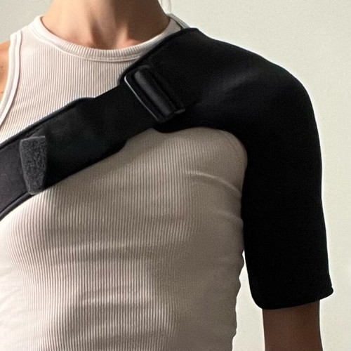 Orthopedic shoulder and arm brace like new, adjustable support