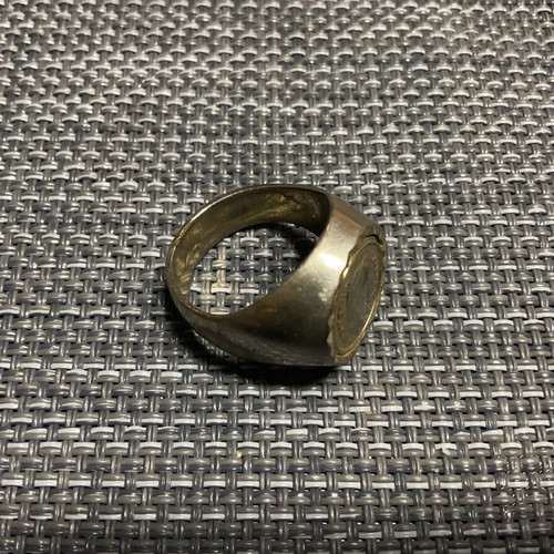 Men's metal ring used with signs of wear