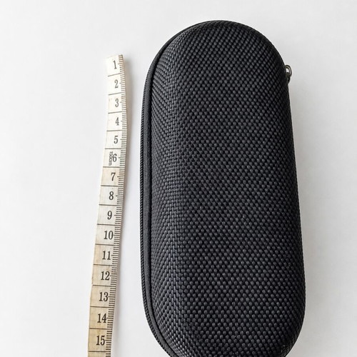 Black hard-shell glasses case with zip closure