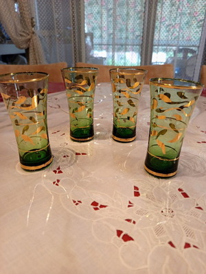 Vintage liqueur glasses set of 4 used green fine glass with gold motif