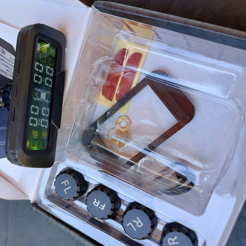 Wireless tire pressure and temperature monitoring system new