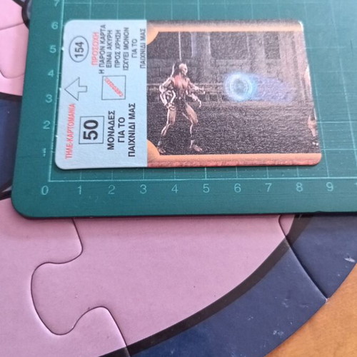 Retro Greek Phone Card "ΤΗΛΕ-ΚΑΡΤΟΜΑΝΙΑ" Mortal Kombat used