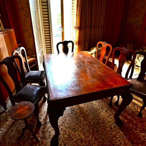 Dining table used with 6 walnut chairs