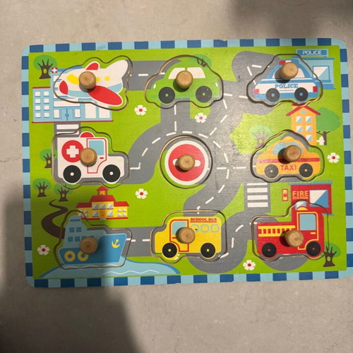 Puzzle with car pegs used