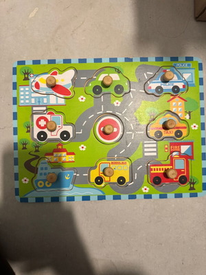 Puzzle with car pegs used