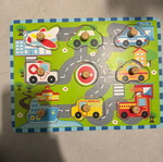 Puzzle with car pegs used