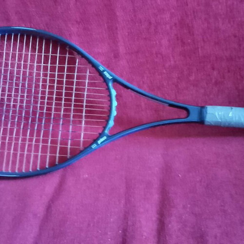 Lioquid Crystal Polymer 1998 rackets like new with case
