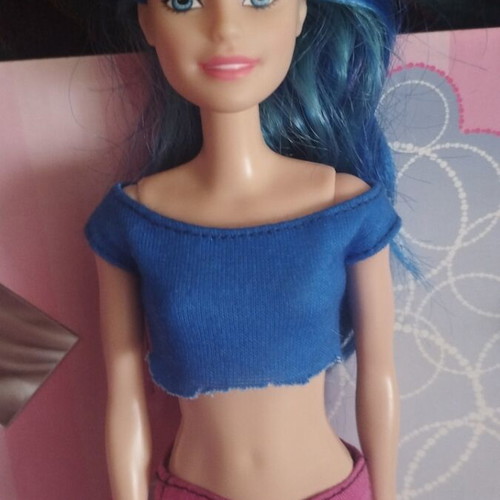 Barbie doll with blue hair