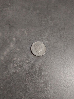 British 5 pence coin 1991 used
