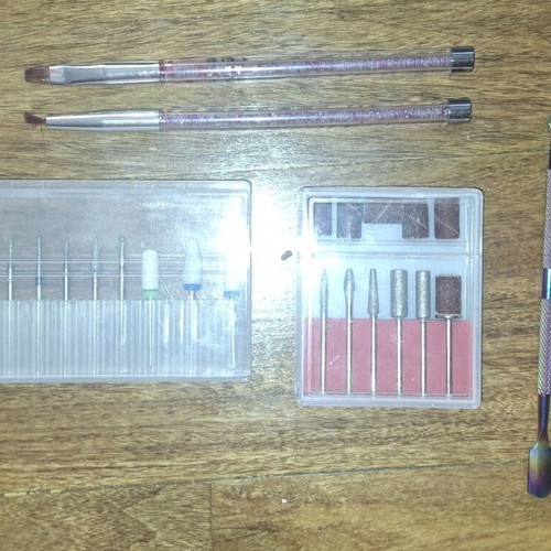 Nail set with professional nail drill bits, brushes and 2 nail pushers