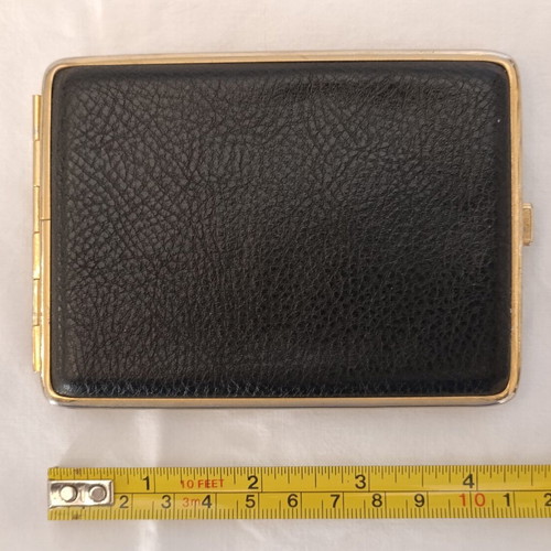 Classic cigarette case used, black leatherette with bronze interior