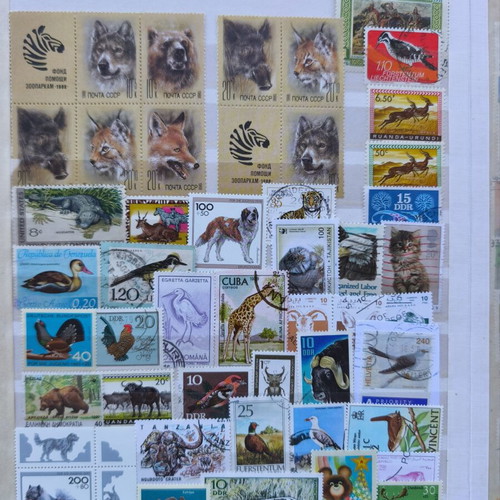 Album A4 16 pages like new with multinational animal stamp collection