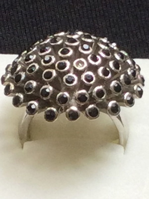 Mushroom-shaped ring with black stones like new