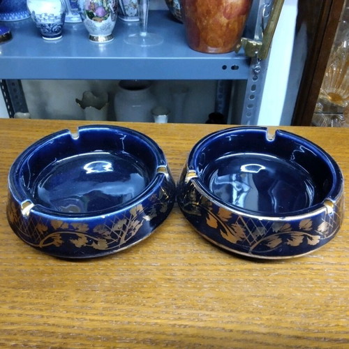 Porcelain ashtrays set like new, 2 pieces with gilded details