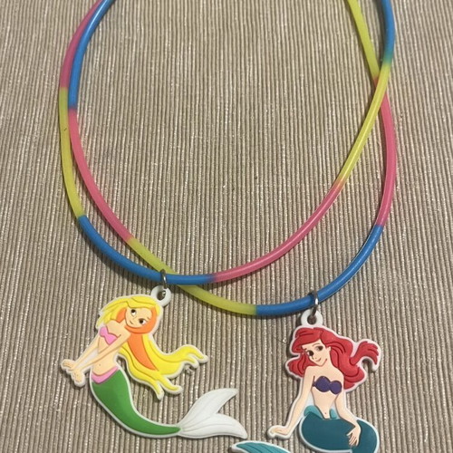 Children's necklaces with Ariel and Arista mermaid charms, like new