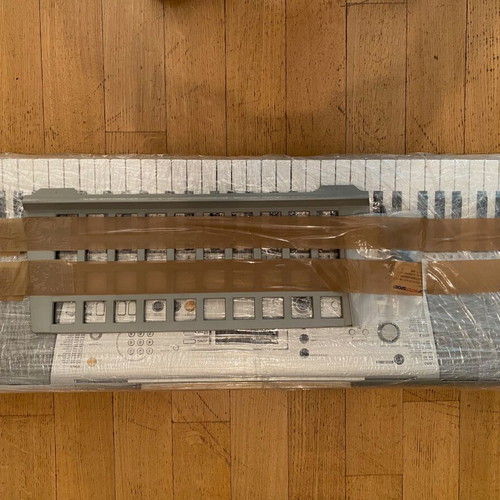 Yamaha PSR E 303 piano keyboard like new with stand and accessories