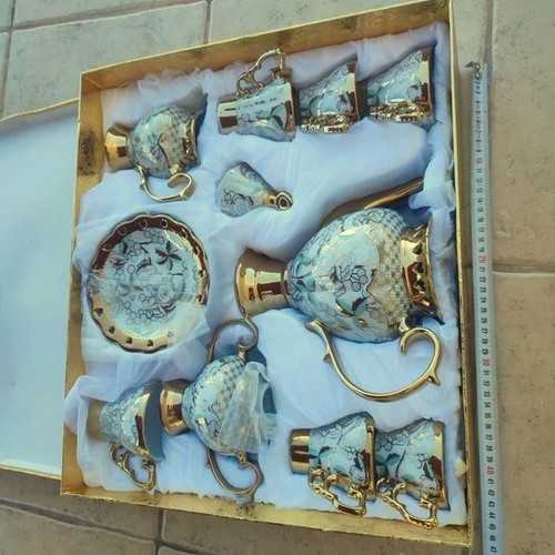 Porcelain tea and coffee set new, luxury with gold and floral details