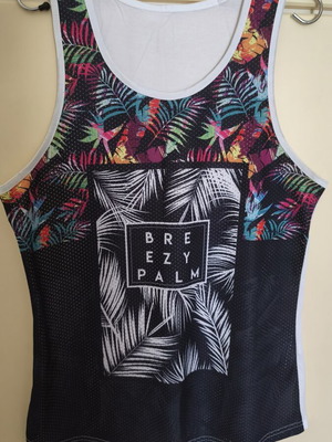 Men's colorful sleeveless shirt used, size L