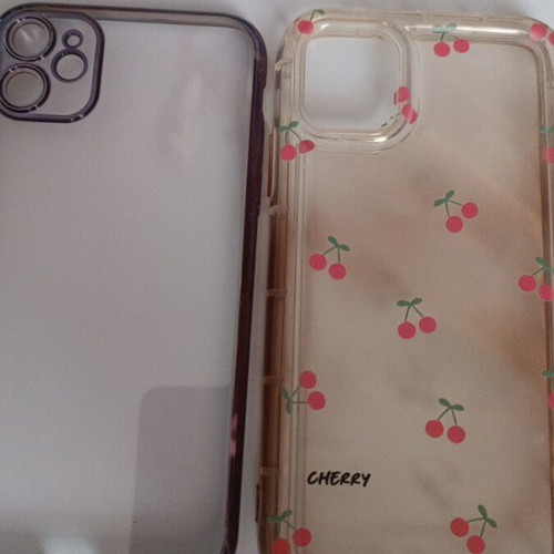 iPhone 11 cases, one used cherry design and one unused transparent