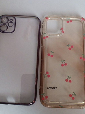 iPhone 11 cases, one used cherry design and one unused transparent