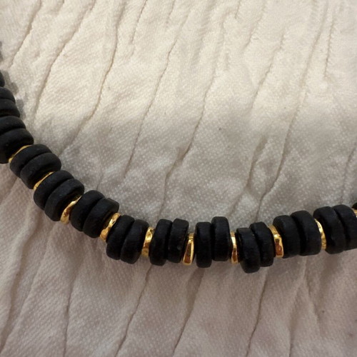 Necklace set used with black and gold beads and steel chain