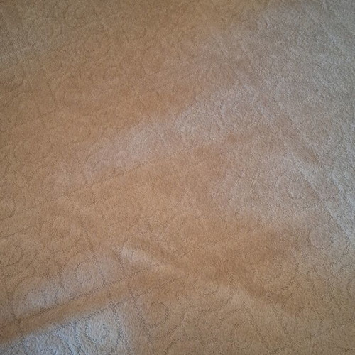 Beige rug large 1.98 × 2.90 with embossed design, used