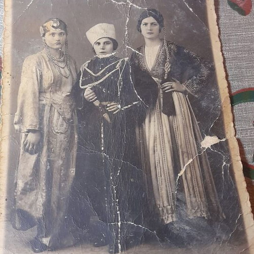 Vintage folklore photograph used, early 20th century, handwritten back