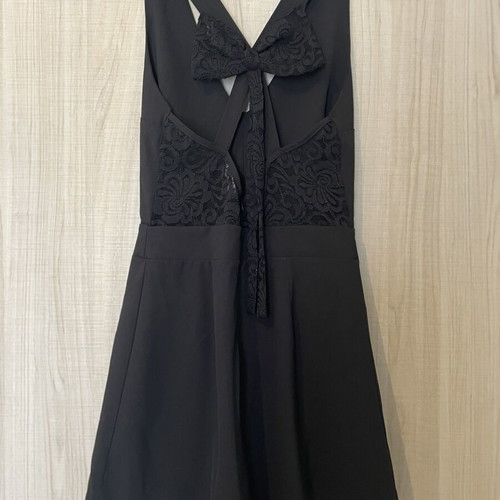 Black playsuit used with lace details and open back, size M