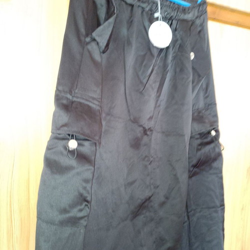 Satin skirt long black new, pockets and back slit, size M/L