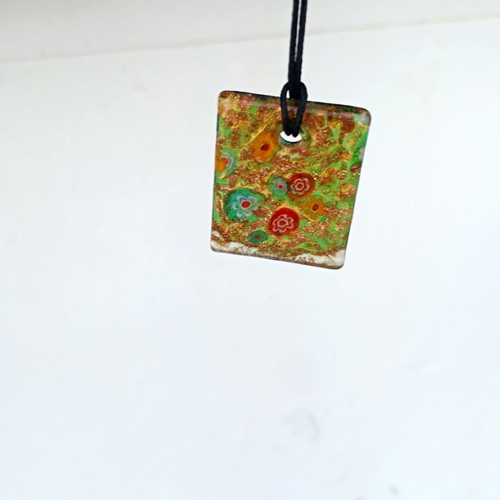 Murano pendant with millefiori floral design and aventurine base