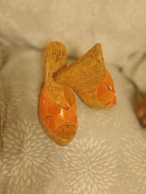 Mules platform sandals with cork sole and transparent orange straps