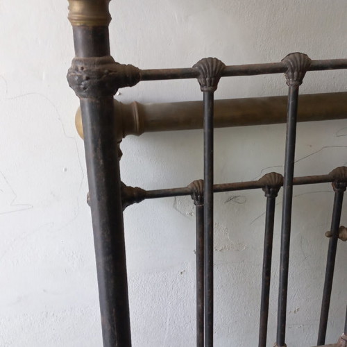 Solid iron bed with brass decorations used