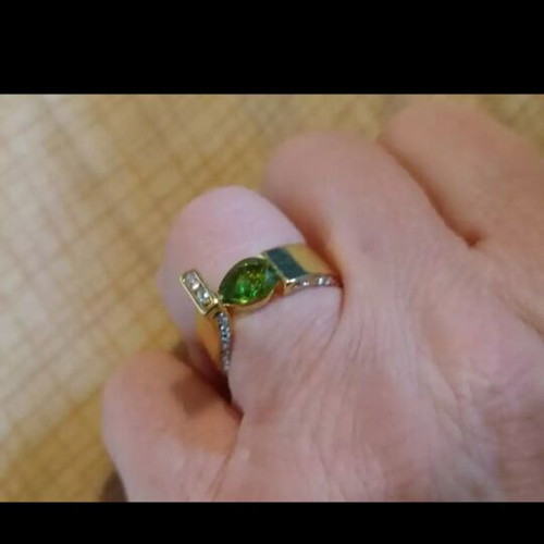 Ring with diamonds and green zircon, new