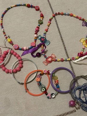 Girls' accessories used, 10 bracelets and 2 beaded necklaces