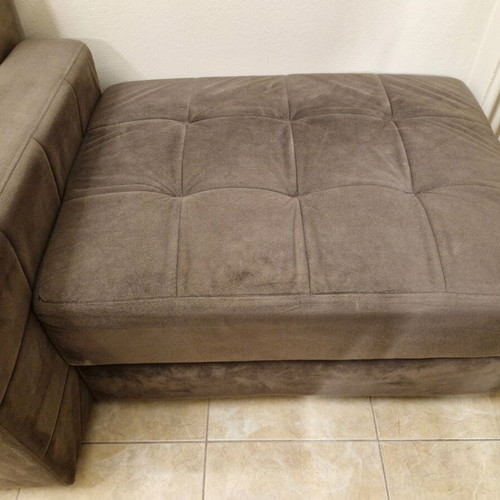 Sofa bed with pouf used, storage space
