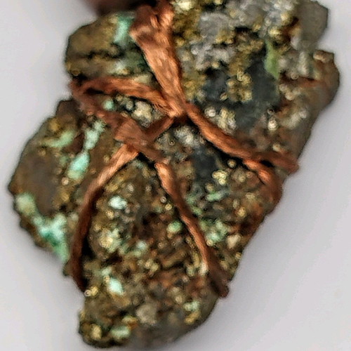Pendant with pyrite new, gold copper wire and leather