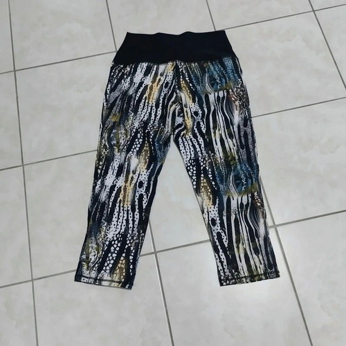 Baya sports collant 3/4 multicolor, like new, with front pocket