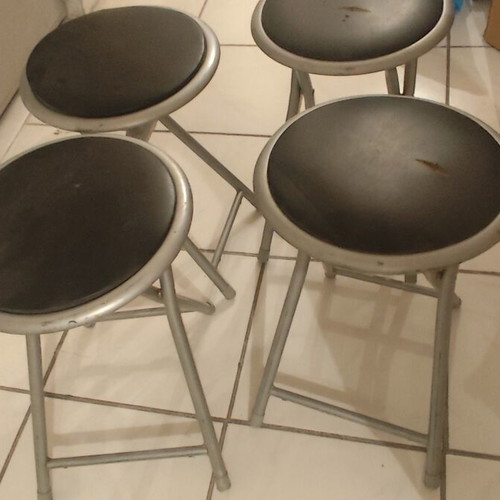Stools used, set of 4 with slight tears