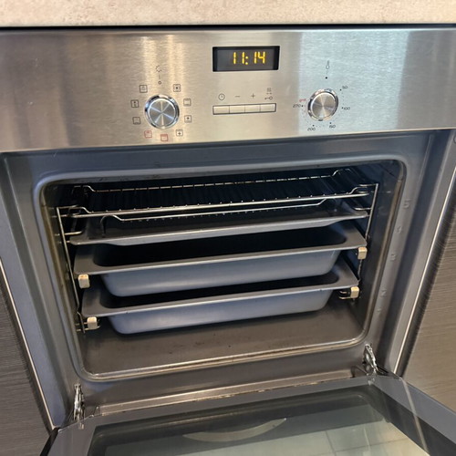 Kitchen cabinets like new with built-in Pitsos oven and island