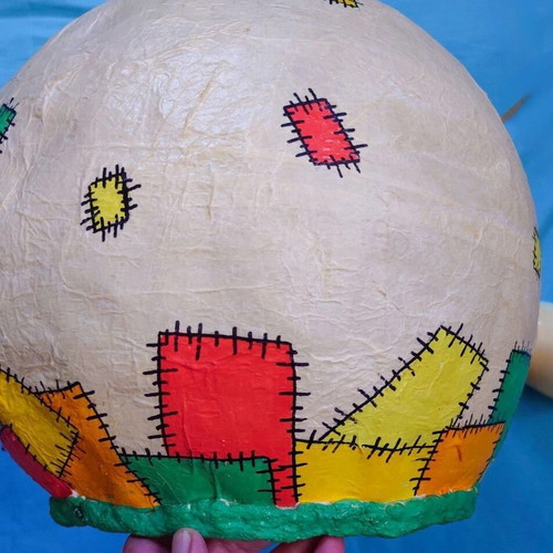 Handmade ceiling light from papier-mâché used, ideal for children's room