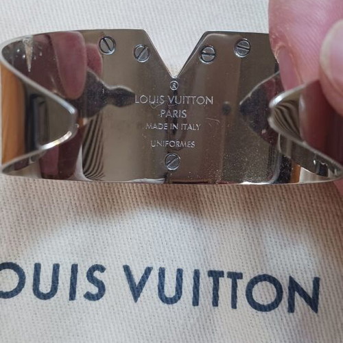 Louis Vuitton metal bracelet like new, gold and silver