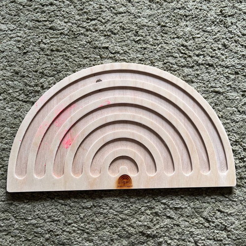 Rainbow sensory play disk used