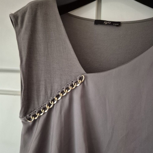 Blouse gray-beige elastic with gold detail and ruffle