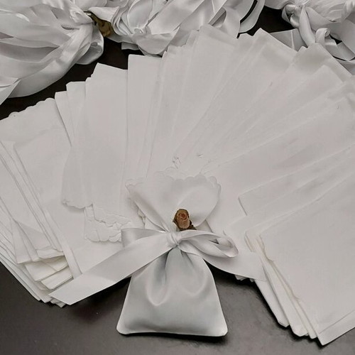White pouches for bombonieres like new, pack of 133 pieces