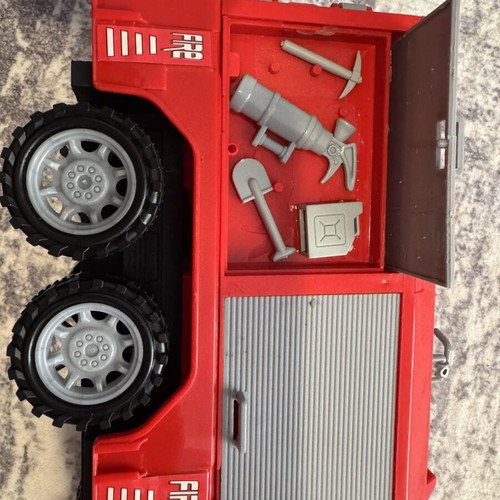 Fire truck toy used with sound, light, and water pump